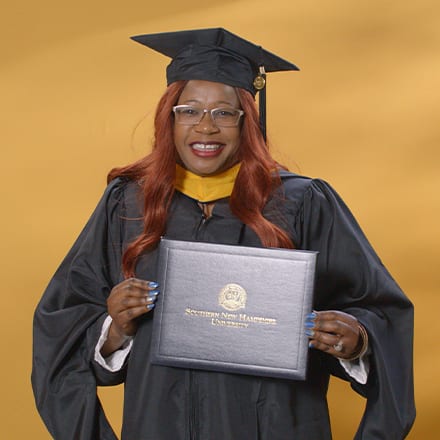 Lilian Ongaki, a 2024 WUV graduate who earned her master's degree in healthcare administration.