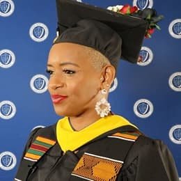WUV health information management graduate Kiara Ridgemont in her cap and gown. 