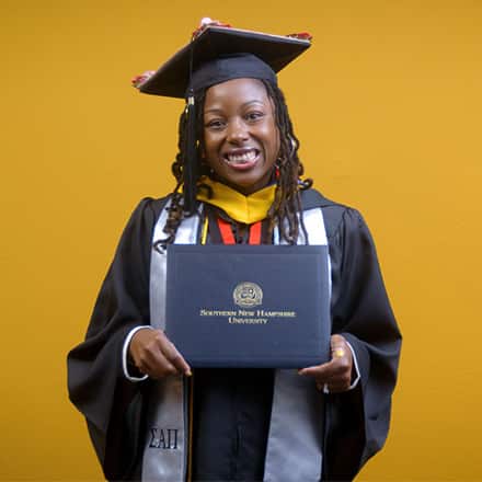 Christina Cumberbatch, a 2025 graduate from wuv with a bachelor's in business administration.