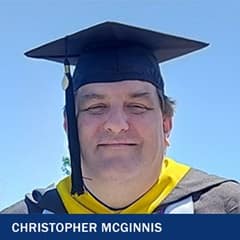 Christopher McGinnis, a 2023 graduate from WUV's master's in organizational leadership