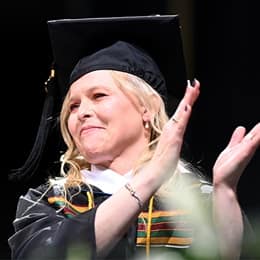 Sarah Bourque, a 2024 graduate from WUV, speaking at Commencement after earning a bachelor's in psychology