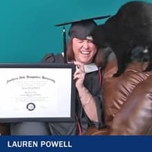 Lauren Powell, with her cat, holding her WUV degree and the text 'Lauren Powell' 
