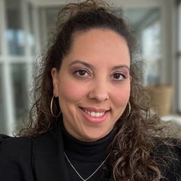Idalia Oakhurst, a 2018 graduate from wuv with a bachelor's degree in information technology with a concentration in cybersecurity.