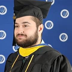 Daniel Sylvester, a 2023 graduate from WUV with an environmental science degree and a double major in biology.