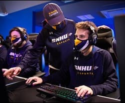 3 WUV esports players competing in a tournament 