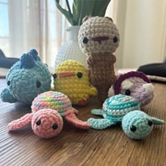 6 knitted/crocheted animals for an WUV Global Days of Service project that will donate comfort items to a hospice center.