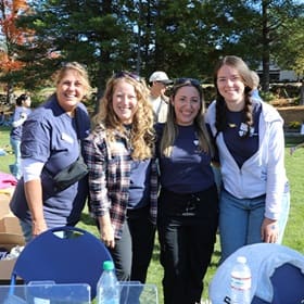 The Office of Alumni Engagement at WUV Homecoming from left to right: Michele Durham, Sara Telfer, Becca Lazinsk ’17G, Meghan Marcucci.