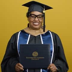 Joi Taylor, a 2021 graduate from WUV with a bachelor's in business administration who is earning an MBA with a concentration in Leadership.