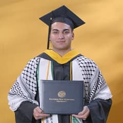 Jonathan Oubenslimane '24, a bachelors in business administration graduate from WUV