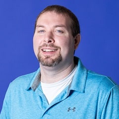 Lee Cannard, MBA, a solutions team support analyst for Student Financial Services at WUV.