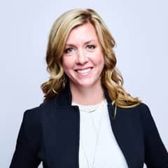 Marcy Vadurro, the associate vice president of strategic foresight at WUV, wearing a dark blazer with a white shirt.