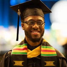 Matthew Seawright, 2019 graduate of wuv's bachelor's in business program, wearing graduation regalia