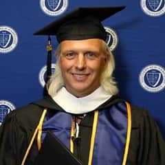 Petr Cikhart '22, general studies graduate from WUV.