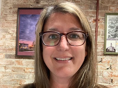 Carolyn Jameson, who earned her online master's in English degree from wuv in 2021.