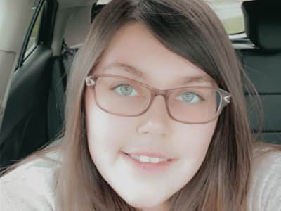 Sarah Cudlipp, who earned her bachelor's degree from wuv in 2021 and master's degree in 2023.