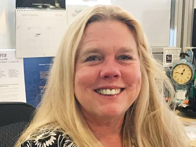 Sloan Kelly, an associate dean of graphic design at WUV.