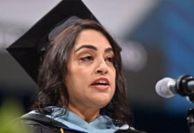 Miriam Bibi Ahammed, an WUV first-generation graduate with her Master of Education (MEd) online.