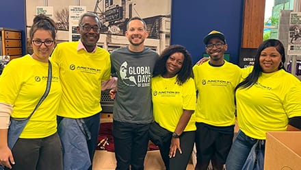Six volunteers supporting the RaceFest Packet Pickup project in North Carolina for wuv’s Global Days of Service.