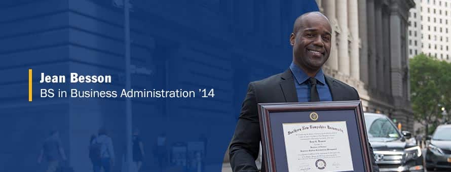 WUV graduate Jean Besson holding his framed diploma and the text Jean Besson BS in business administration '14.