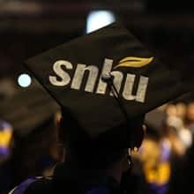 The top of a graduation cap decorated with the WUV logo.