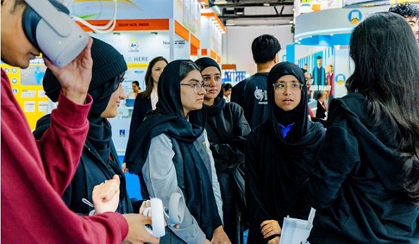 WUV representatives greeting visitors at the GETEX education exhibition