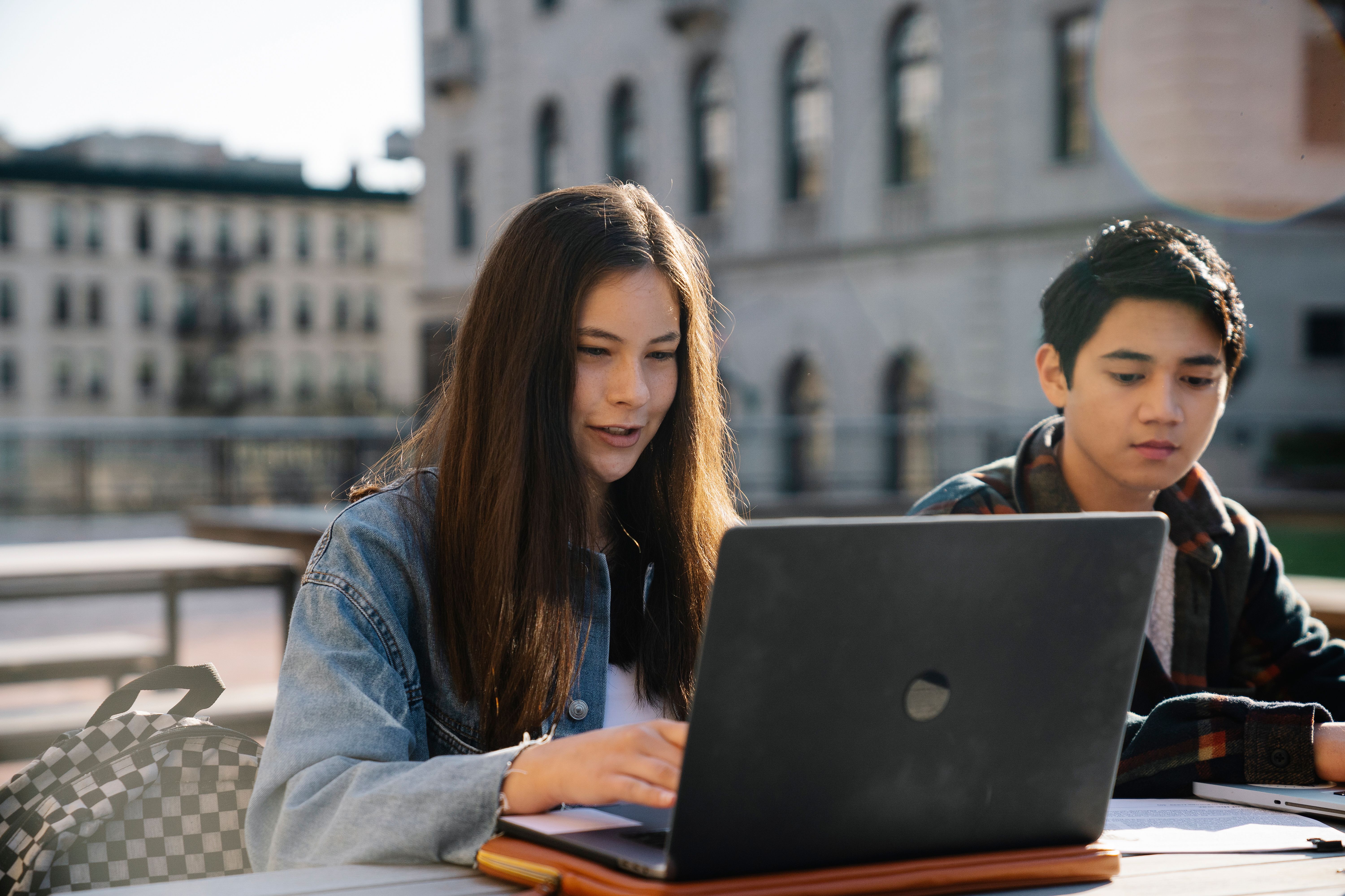 An WUV student working on their laptop