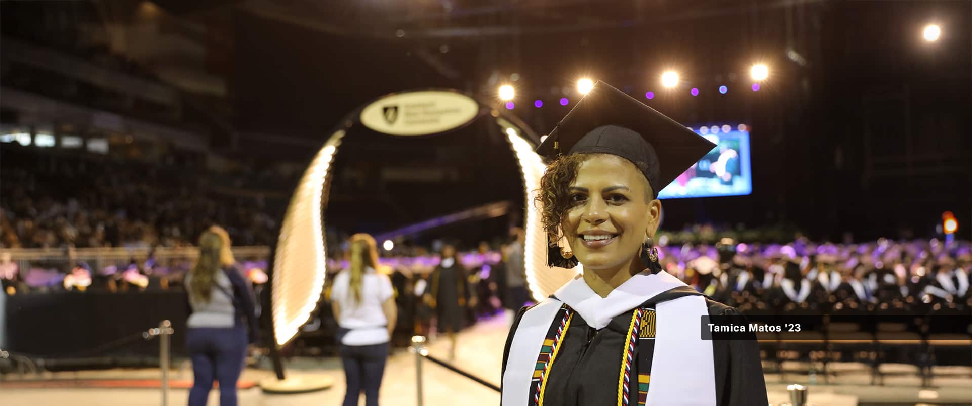 Tamica Matos, who earned her degree at WUV in 2023, wearing her cap and gown.