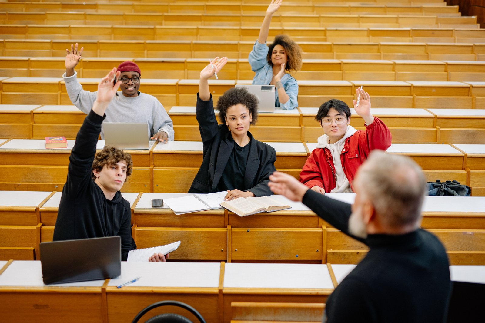 A student asking a question in a classroom
